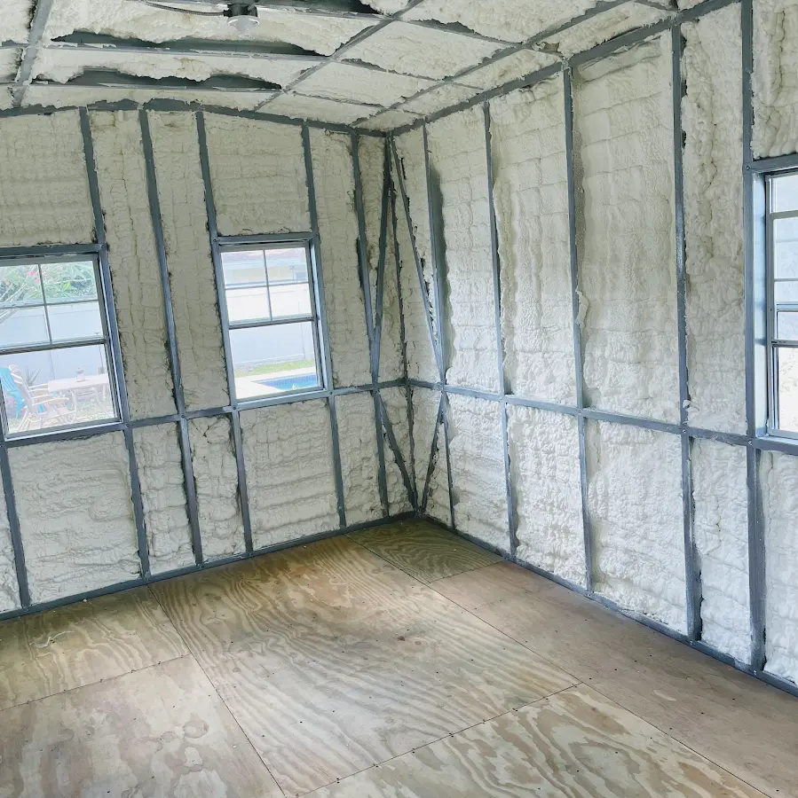 Closed-cell spray foam insulation applied to wall cavities in a residential project in Lake Worth Beach